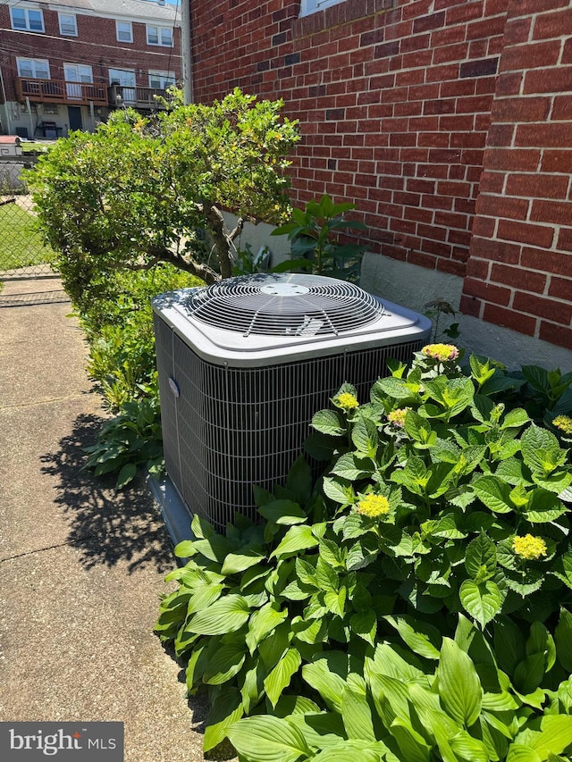 1525 Clairidge Rd, Baltimore, MD 21207 - exterior view of a central air condition unit and brick siding