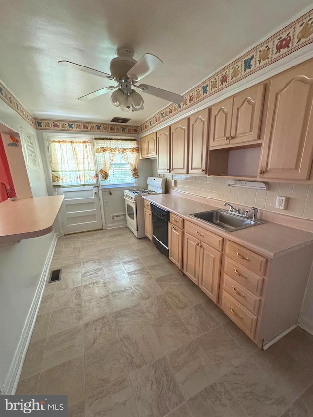 1525 Clairidge Rd, Baltimore, MD 21207 - kitchen with white gas stove, black dishwasher, a ceiling fan, and decorative backsplash
