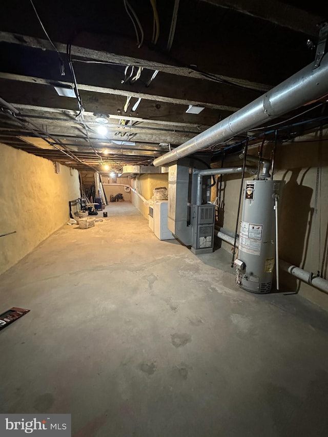 1009 W Susquehanna Ave, Philadelphia, PA 19122 - unfinished basement with water heater and heating unit