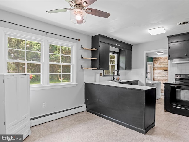 1002 Sherwood Cir, Salisbury, MD 21804 - kitchen with a baseboard radiator, black range with electric cooktop, dark cabinets, light countertops, and open shelves
