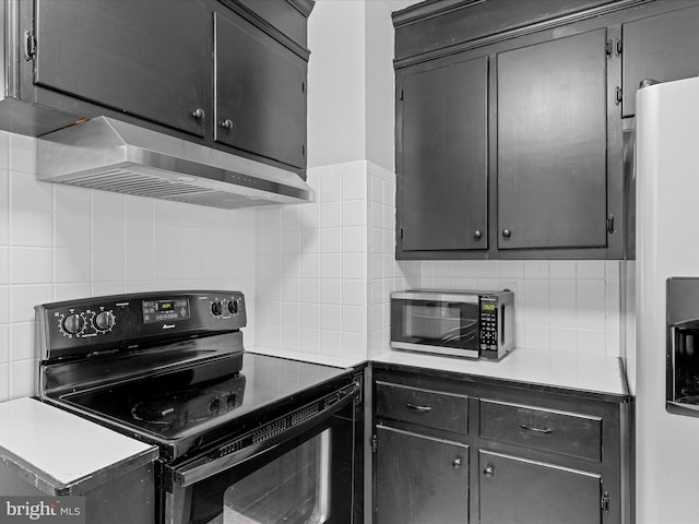1002 Sherwood Cir, Salisbury, MD 21804 - kitchen featuring stainless steel appliances, under cabinet range hood, tasteful backsplash, and light countertops