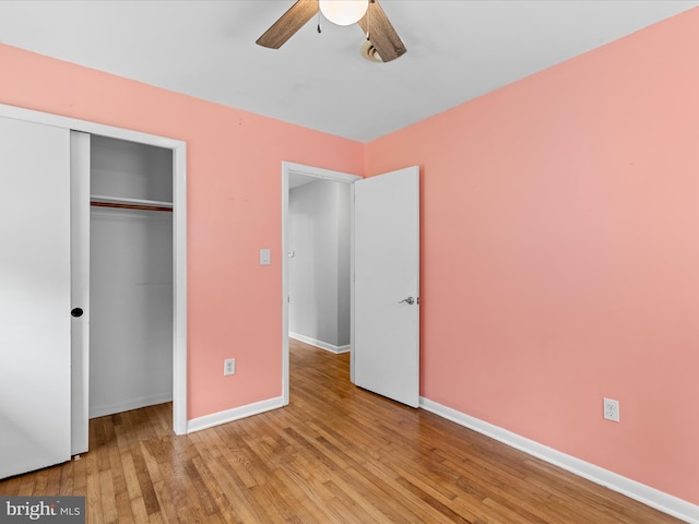 1002 Sherwood Cir, Salisbury, MD 21804 - unfurnished bedroom with wood finished floors, a closet, and a ceiling fan