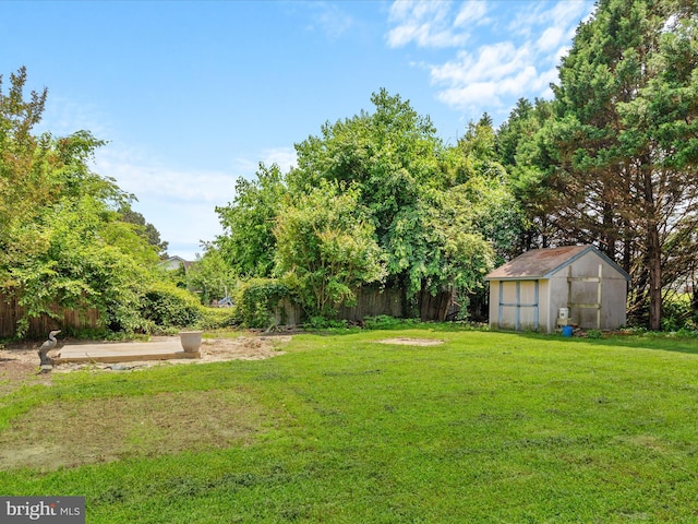 1002 Sherwood Cir, Salisbury, MD 21804 - view of grassy yard featuring a greenhouse and an outdoor structure