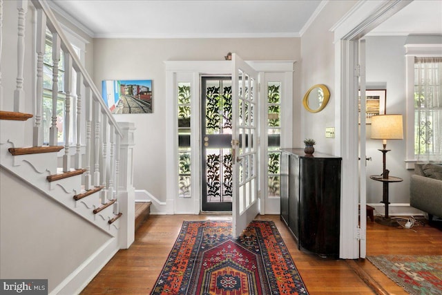 6721 Piney Branch Rd NW, Washington, DC 20012 - entrance foyer featuring stairway, plenty of natural light, wood finished floors, and crown molding