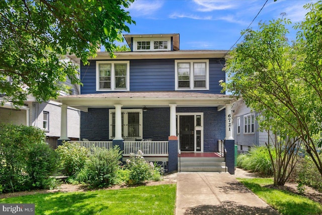 6721 Piney Branch Rd NW, Washington, DC 20012 - traditional style home featuring covered porch and brick siding