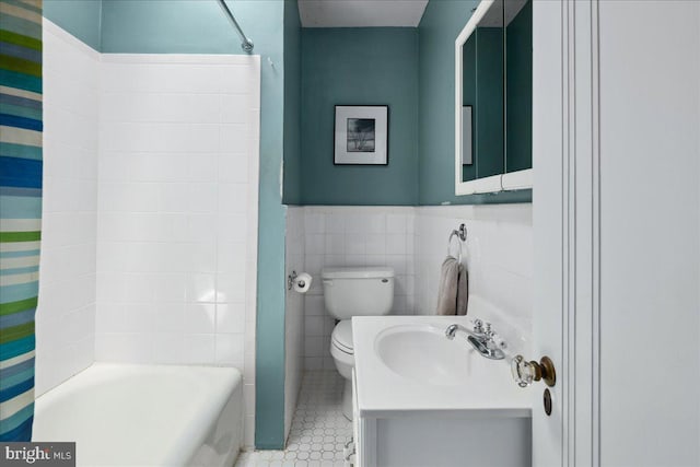 6721 Piney Branch Rd NW, Washington, DC 20012 - full bath with toilet, wainscoting, shower / bath combo, vanity, and tile walls