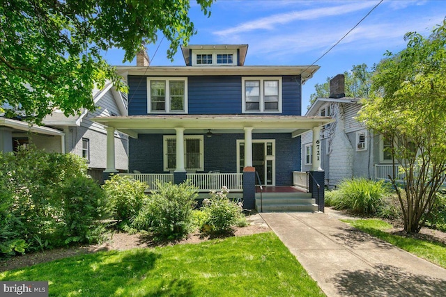 6721 Piney Branch Rd NW, Washington, DC 20012 - american foursquare style home featuring a porch and a chimney
