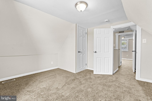 3414 Old York Rd, Baltimore, MD 21218 - carpeted empty room featuring lofted ceiling, baseboards, and a smoke detector