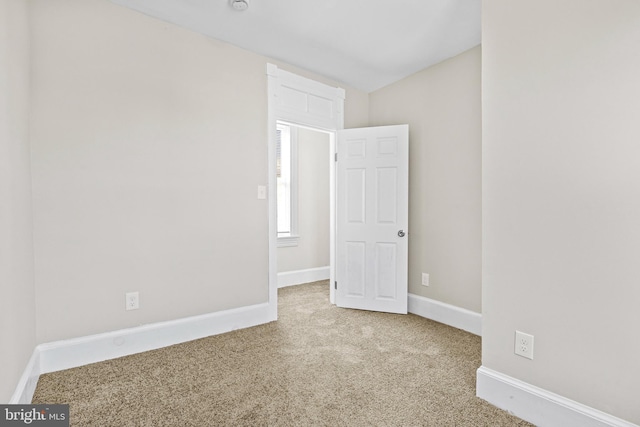 3414 Old York Rd, Baltimore, MD 21218 - carpeted empty room with baseboards and a smoke detector