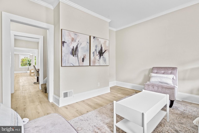 3414 Old York Rd, Baltimore, MD 21218 - sitting room featuring wood finished floors, ornamental molding, and baseboards