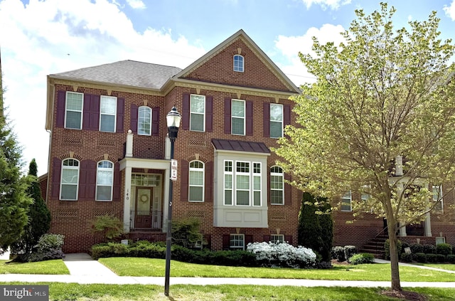 140 Crown Farm Dr, Gaithersburg, MD 20878 - colonial house featuring brick siding and a front yard