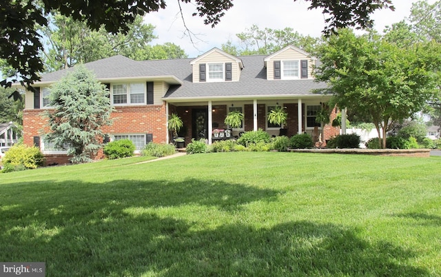 126 Devon Rd, Cinnaminson, NJ 08077 - view of front of home featuring brick siding, a front lawn, and a porch