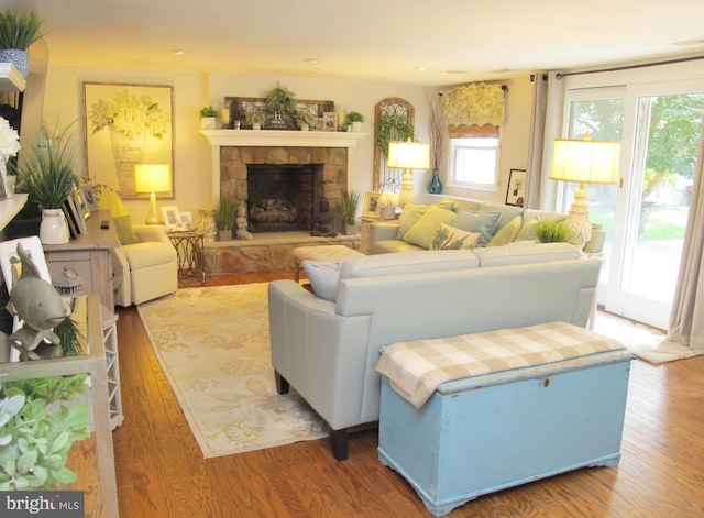 126 Devon Rd, Cinnaminson, NJ 08077 - living room with wood finished floors, a stone fireplace, and recessed lighting