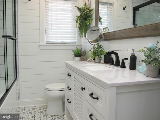 126 Devon Rd, Cinnaminson, NJ 08077 - bathroom featuring vanity, healthy amount of natural light, and combined bath / shower with glass door