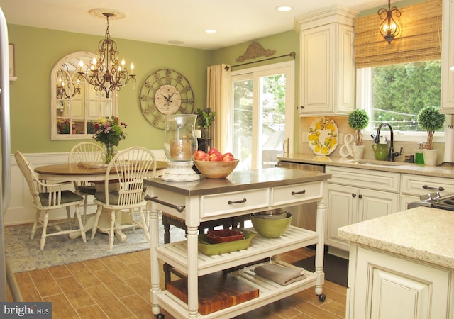 126 Devon Rd, Cinnaminson, NJ 08077 - kitchen with healthy amount of natural light, decorative light fixtures, wood finish floors, a chandelier, and recessed lighting