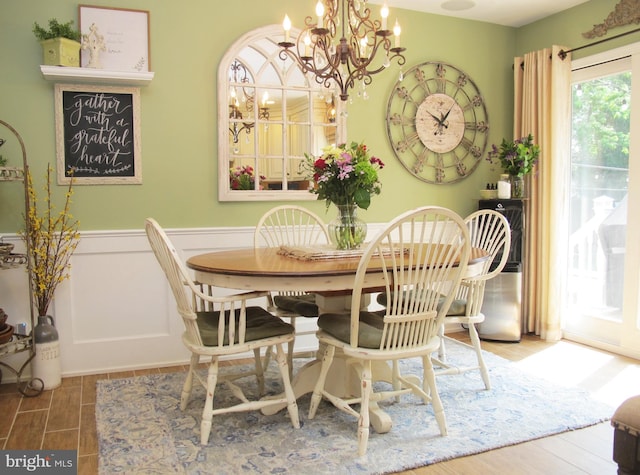 126 Devon Rd, Cinnaminson, NJ 08077 - dining room featuring a chandelier, wainscoting, and wood finished floors