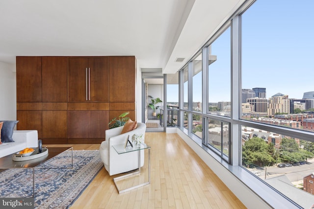 2001 15th St N Unit 1005, Arlington, VA 22201 - living room with a view of city and light wood-style flooring