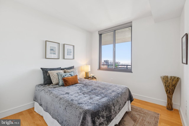 2001 15th St N Unit 1005, Arlington, VA 22201 - bedroom with light wood finished floors and baseboards