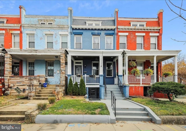 2803 N Capitol St NE, Washington, DC 20002 - townhome / multi-family property featuring a porch, brick siding, and mansard roof