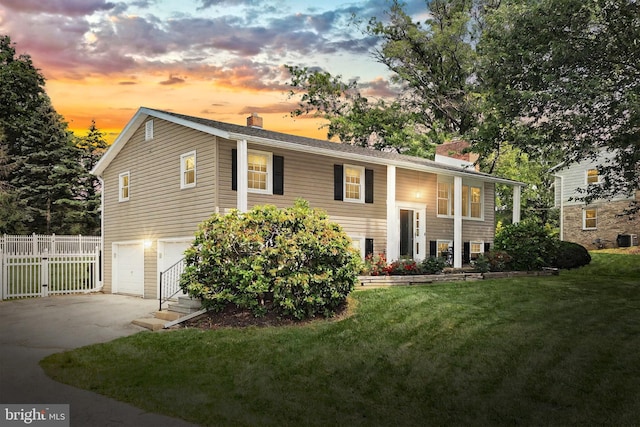 486 Highland Rd, Red Lion, PA 17356 - bi-level home with a chimney, driveway, a garage, and central AC unit