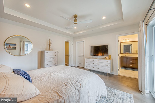 1001 Lakeview Ct Unit 1001, King Of Prussia, PA 19406 - bedroom with a raised ceiling, wood finished floors, recessed lighting, connected bathroom, and ceiling fan