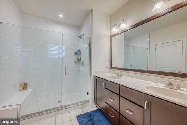 1001 Lakeview Ct Unit 1001, King Of Prussia, PA 19406 - bathroom featuring tile patterned floors, double vanity, and a stall shower