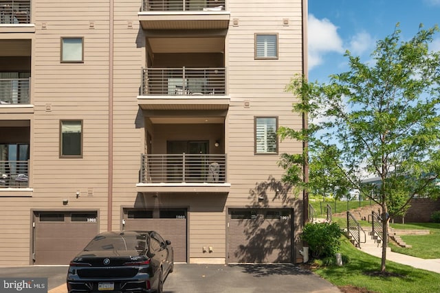 1001 Lakeview Ct Unit 1001, King Of Prussia, PA 19406 - view of property with driveway and an attached garage