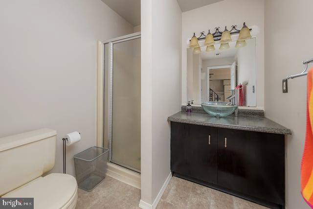 1004 Berwyck Ct, Sicklerville, NJ 08081 - full bathroom featuring toilet, a shower stall, vanity, and baseboards