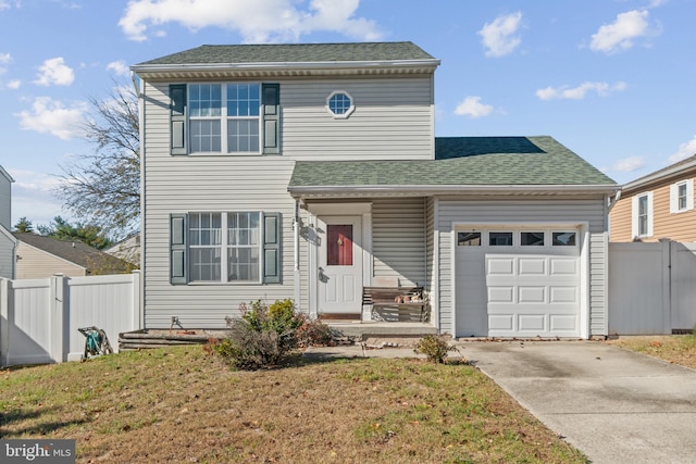 8078 Outing Ave, Pasadena, MD 21122 - traditional-style home featuring a garage, driveway, and roof with shingles