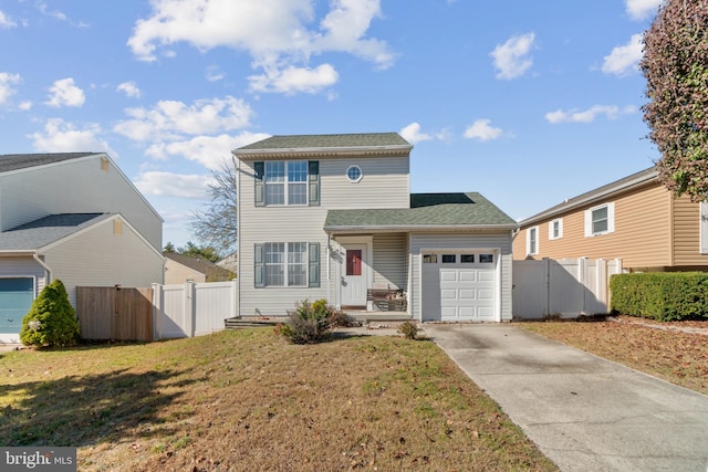 8078 Outing Ave, Pasadena, MD 21122 - traditional-style home featuring an attached garage, concrete driveway, and a gate