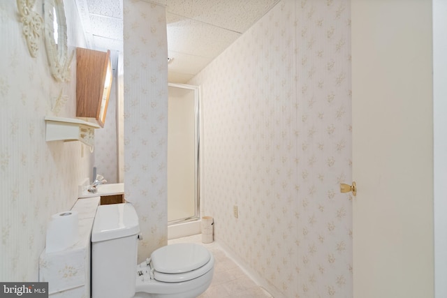 8078 Outing Ave, Pasadena, MD 21122 - bathroom with a shower stall, toilet, vanity, a paneled ceiling, and tile patterned floors