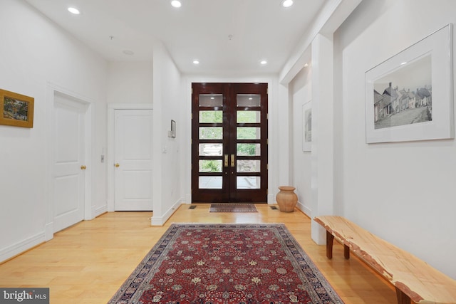 2807 Chesterfield Pl NW, Washington, DC 20008 - entrance foyer featuring wood finished floors, french doors, and recessed lighting