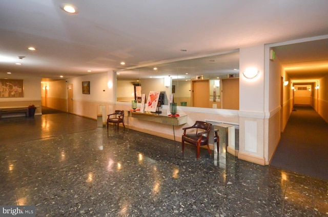 6317 Park Heights Ave Unit 310, Baltimore, MD 21215 - community lobby featuring wainscoting and recessed lighting
