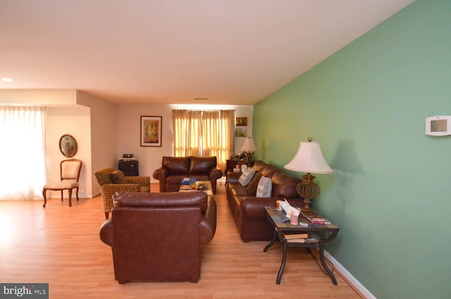 6317 Park Heights Ave Unit 310, Baltimore, MD 21215 - living area with light wood finished floors and baseboards