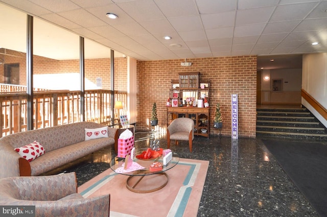 6317 Park Heights Ave Unit 310, Baltimore, MD 21215 - living room featuring granite tiled floors, recessed lighting, and a drop ceiling
