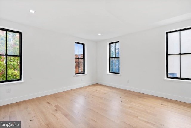 2301 Naudain St, Philadelphia, PA 19146 - empty room with plenty of natural light, wood finished floors, baseboards, and recessed lighting