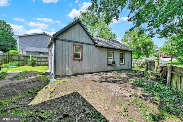 133 S Prospect Ave, Baltimore, MD 21228 - back of property with a fenced backyard and cooling unit