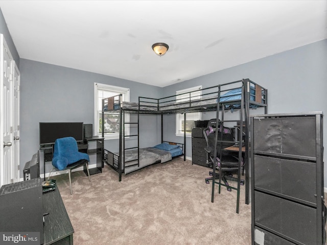 3812 Callaway Ave, Baltimore, MD 21215 - bedroom featuring an office area, carpet, and baseboards