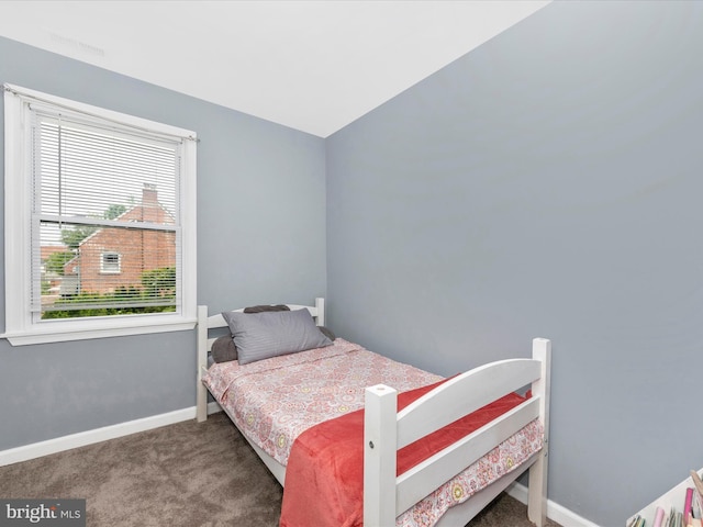 3812 Callaway Ave, Baltimore, MD 21215 - carpeted bedroom with multiple windows and baseboards