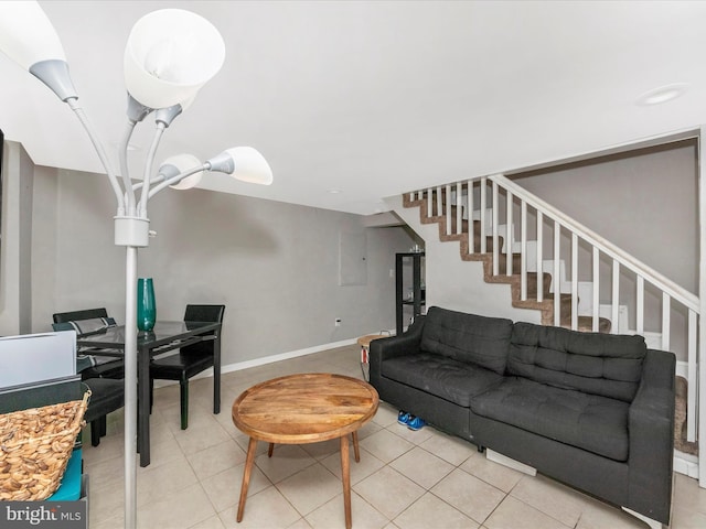3812 Callaway Ave, Baltimore, MD 21215 - tiled living room with stairs