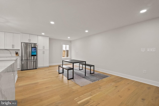 7816 Wendy Ridge Ln, Annandale, VA 22003 - dining area with light wood-type flooring, recessed lighting, and baseboards