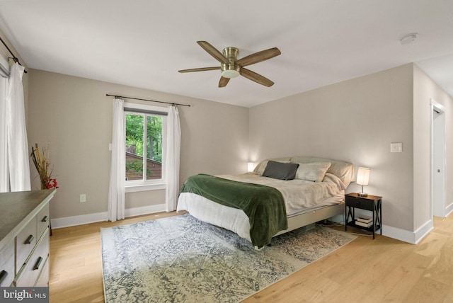 7816 Wendy Ridge Ln, Annandale, VA 22003 - bedroom with light wood-type flooring, baseboards, and ceiling fan