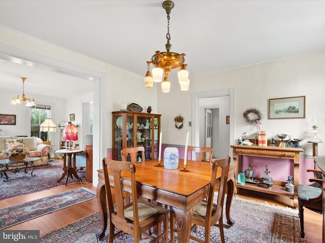 140 Delaware Ave, Laurel, DE 19956 - dining room featuring a chandelier and wood finished floors