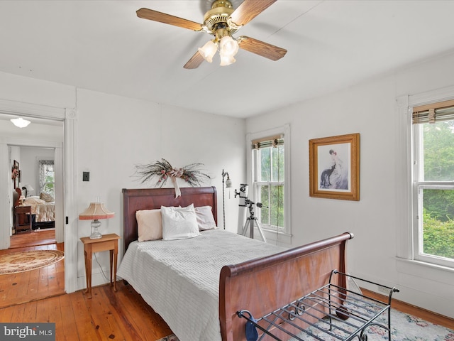 140 Delaware Ave, Laurel, DE 19956 - bedroom featuring multiple windows, wood-type flooring, and ceiling fan