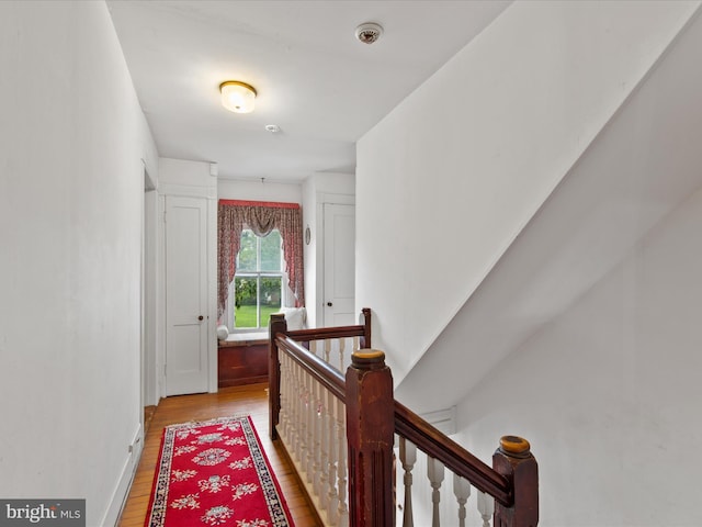 140 Delaware Ave, Laurel, DE 19956 - hall featuring light wood-style flooring and an upstairs landing
