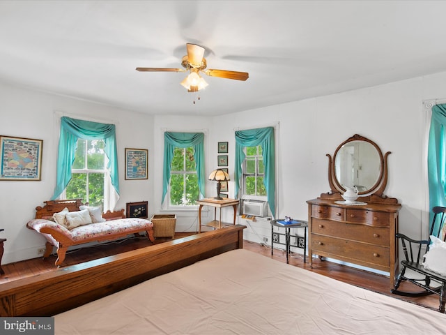 140 Delaware Ave, Laurel, DE 19956 - bedroom featuring cooling unit, wood finished floors, and a ceiling fan
