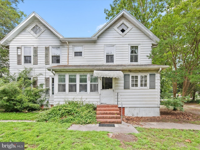 140 Delaware Ave, Laurel, DE 19956 - view of front of home with entry steps and a front lawn