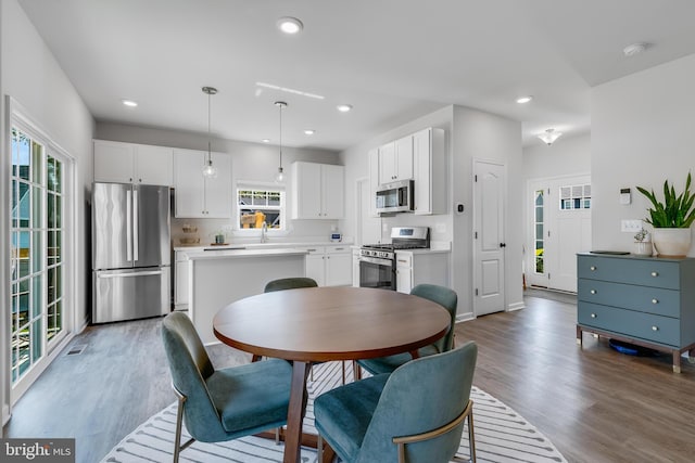 9307 Cedar Forest Dr, Fredericksburg, VA 22408 - dining space with wood finished floors and recessed lighting