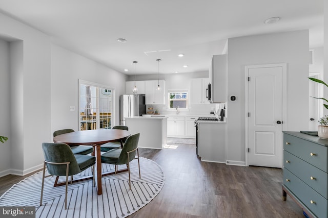 9307 Cedar Forest Dr, Fredericksburg, VA 22408 - dining space with dark wood-style flooring and recessed lighting
