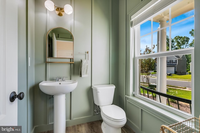 9307 Cedar Forest Dr, Fredericksburg, VA 22408 - half bath featuring wood finished floors and plenty of natural light